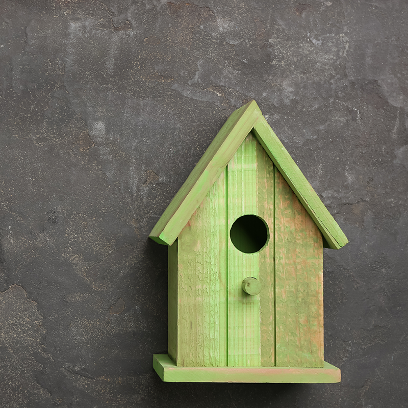 Photo of a bid house representing an empty nester's home ready for a downsizing move